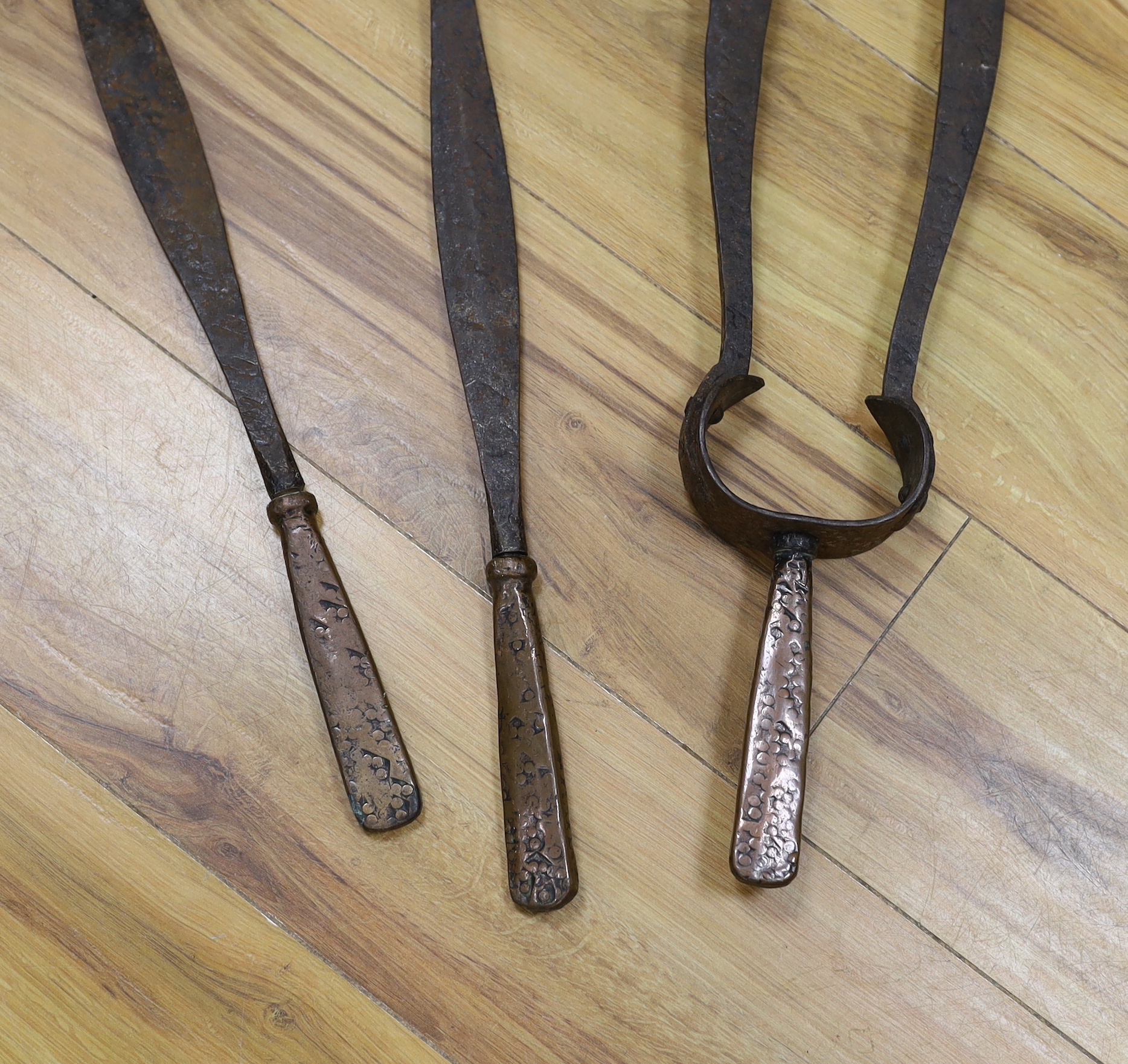 A set of Arts & Crafts fire irons